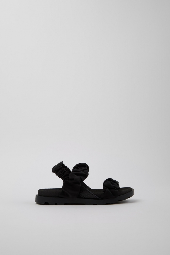 Neu Eingetroffen Camper Brutus Sandal - Schwarze Kindersandale aus Leder und Recycling-PET. Neu Eingetroffen Camper Brutus Sandal - Schwarze Kindersandale aus Leder und Recycling-PET.