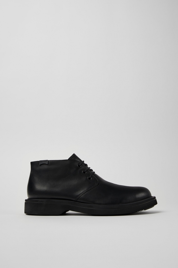 Neu Eingetroffen Camper Norman - Schwarze Herrenstiefelette aus Leder. Neu Eingetroffen Camper Norman - Schwarze Herrenstiefelette aus Leder.