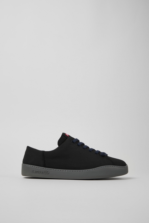 Neu Eingetroffen Camper Peu Touring - Schwarzer Herrensneaker aus Recycling-PET. Neu Eingetroffen Camper Peu Touring - Schwarzer Herrensneaker aus Recycling-PET.