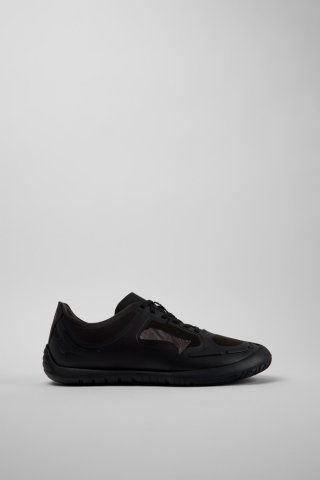 Neu Eingetroffen Camper Path - Schwarzer Herrensneaker aus Textil. Neu Eingetroffen Camper Path - Schwarzer Herrensneaker aus Textil.