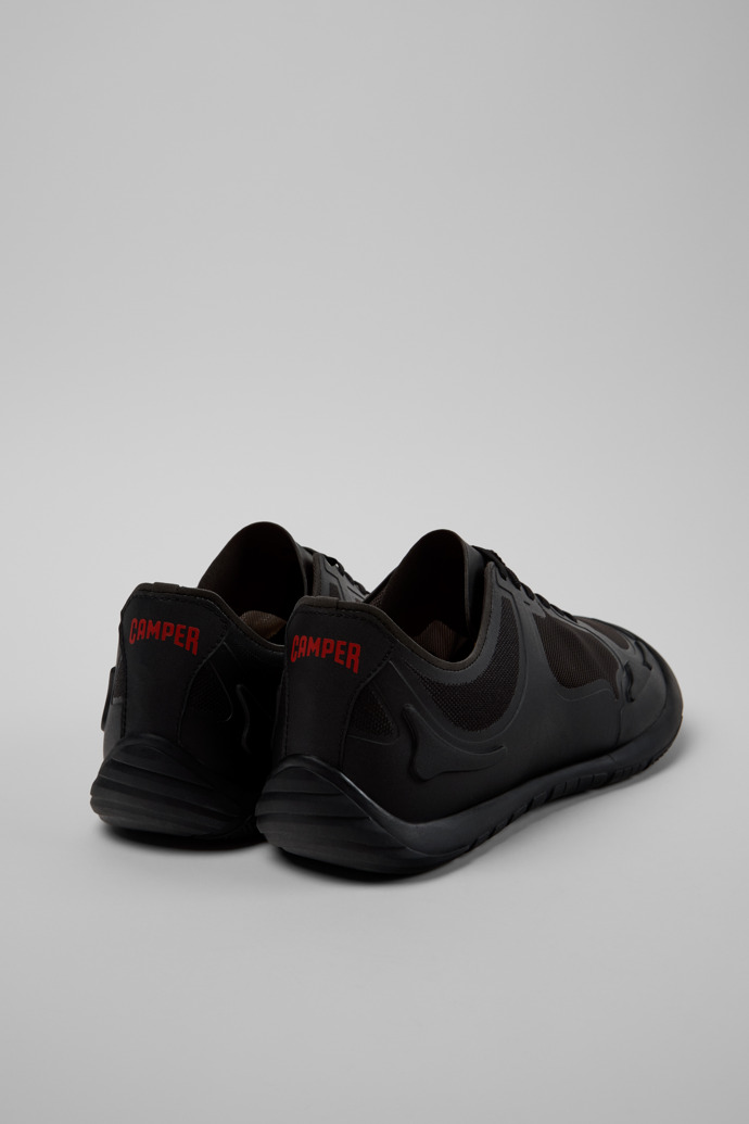 Neu Eingetroffen Camper Path - Schwarzer Herrensneaker aus Textil.